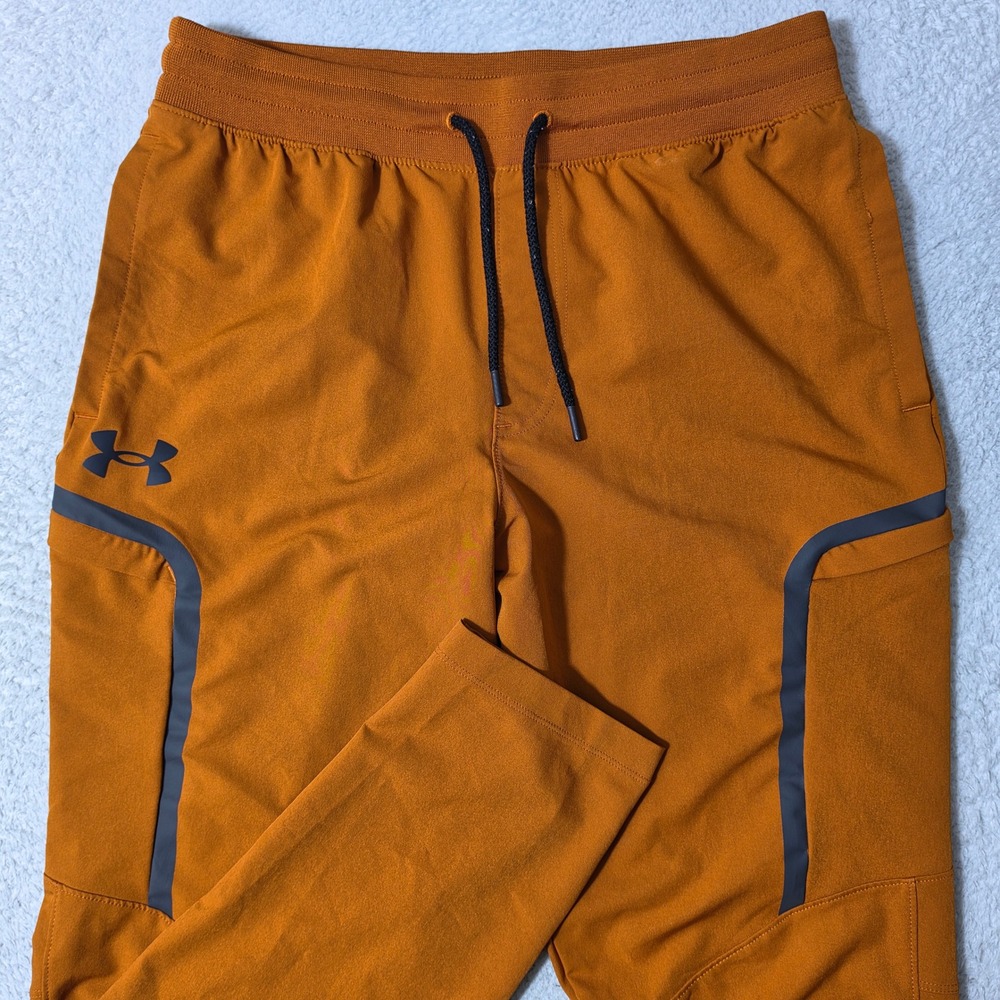 NEW Under Armour Elite Pants Mens L Orange Stretch Unstoppable Joggers 1373864